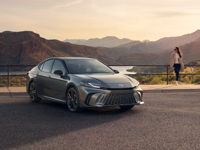 Toyota Camry parked at a resevoir.